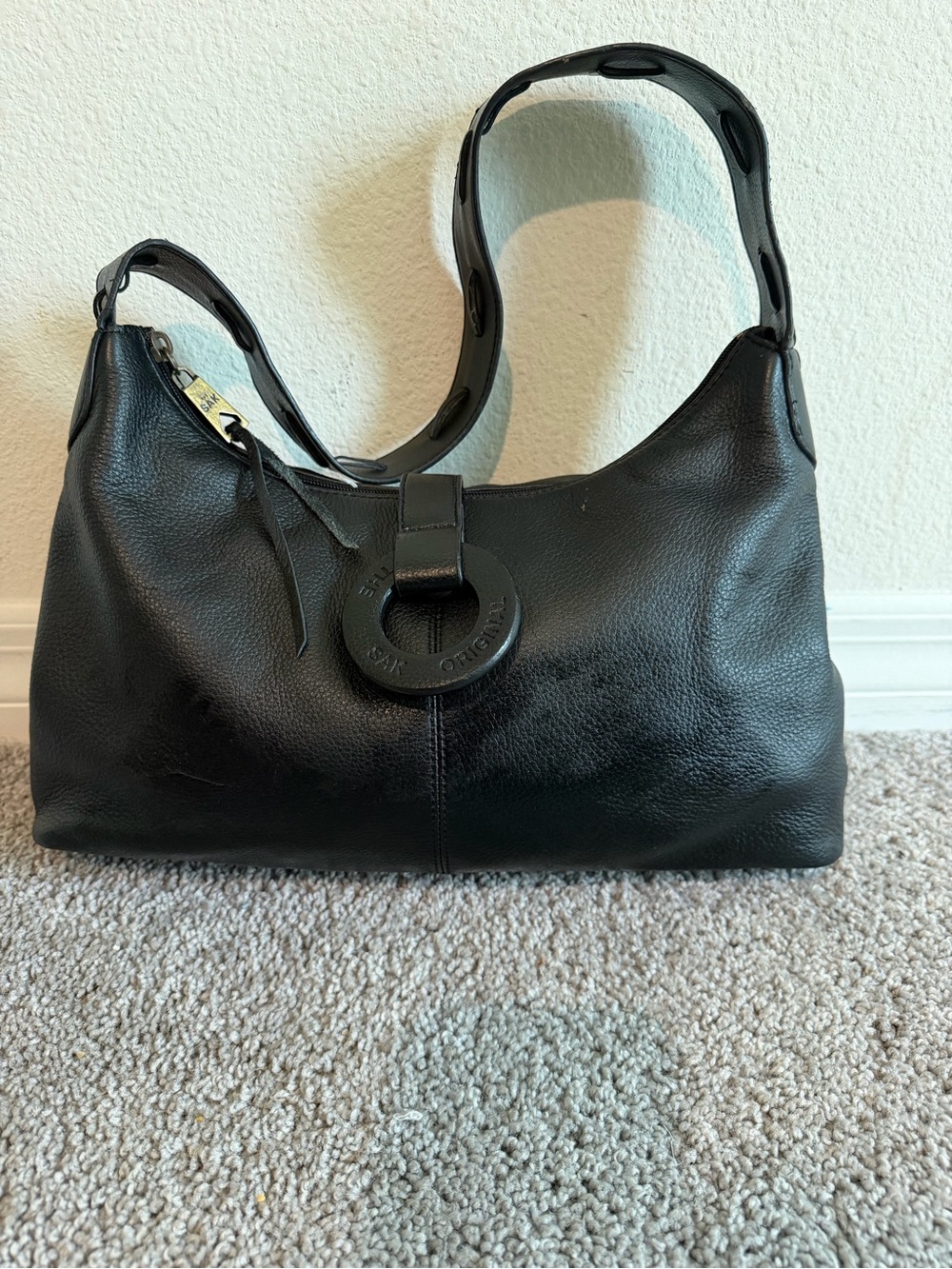 The Sak Black Leather Shoulder Bag with Ring Accent
